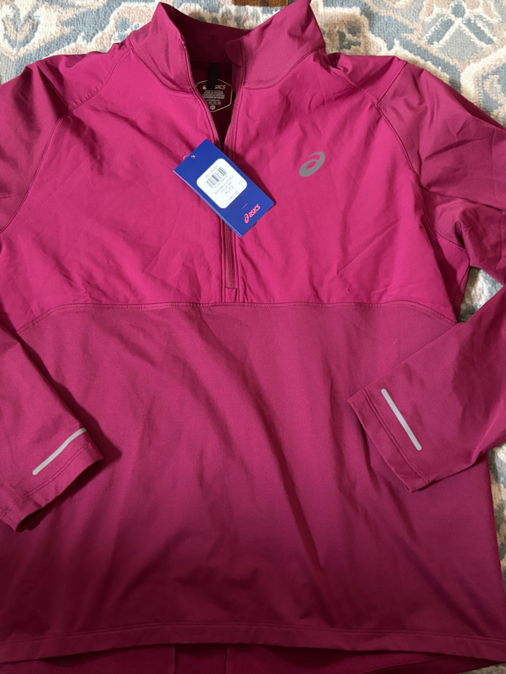 ASICS women’s Berry Magenta Quarter-Zip Training Top